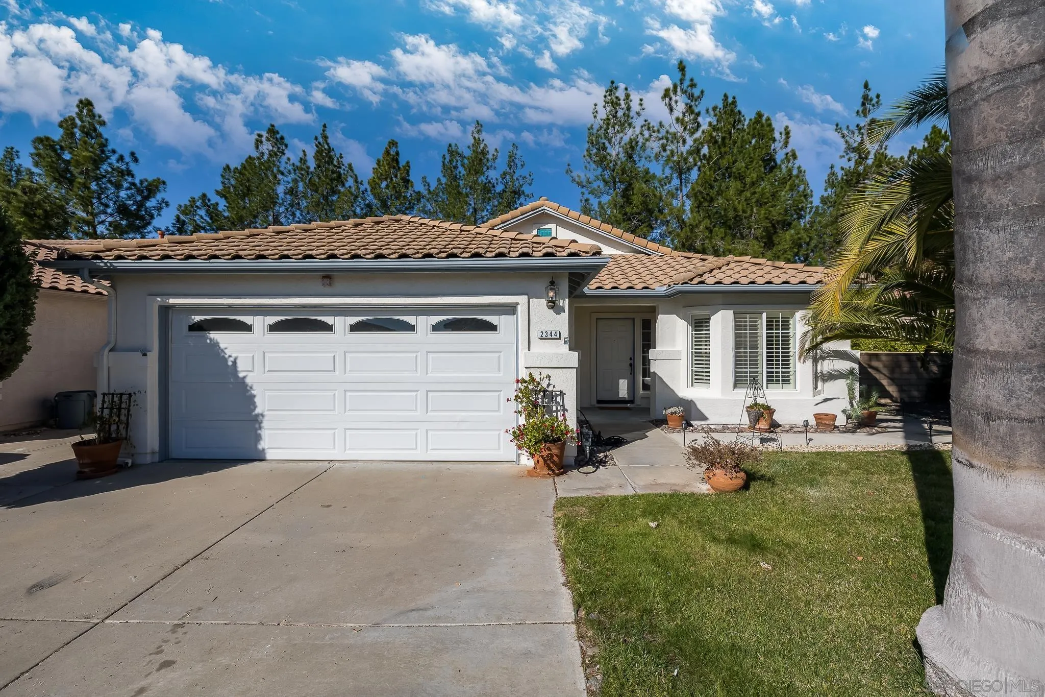 2344 Hyacinth Road Alpine, CA 91901 - Photo 29 of 29 a view of a house with a patio and a yard