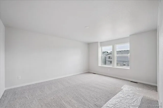 a bathroom with a double vanity sink and mirror