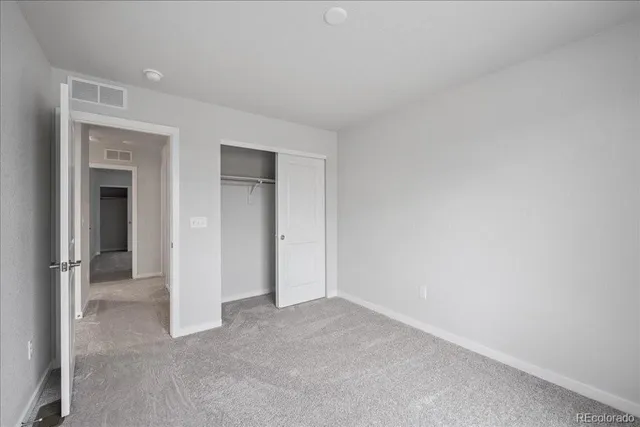 a bathroom with a sink and a mirror with bathtub