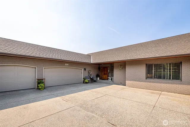 a front view of a house with patio
