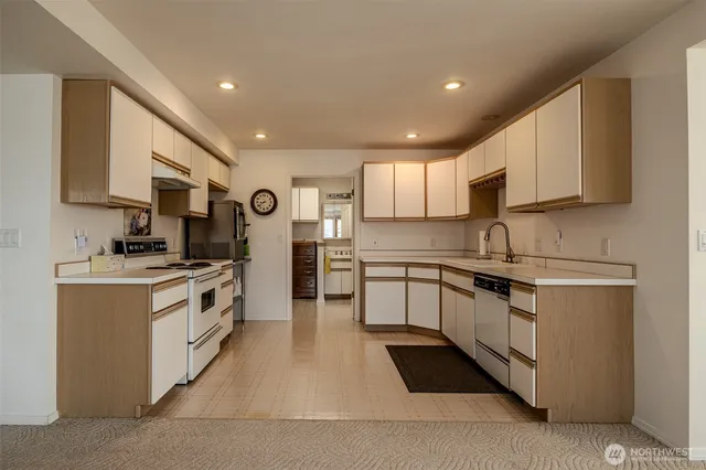 a view of cabinets with wooden floor