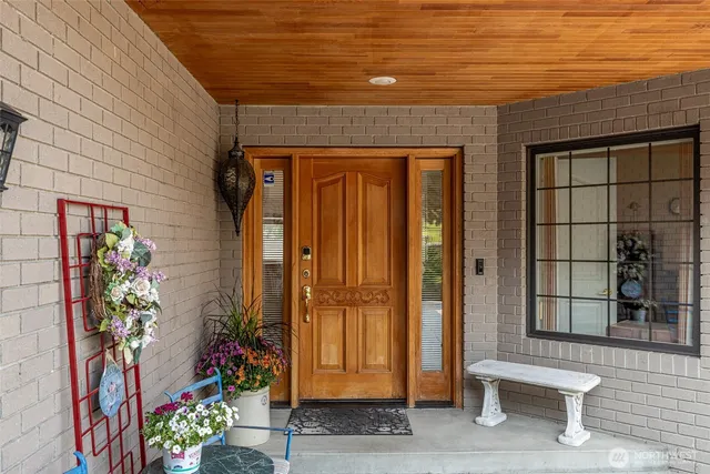 a view of room with window and hardwood floor