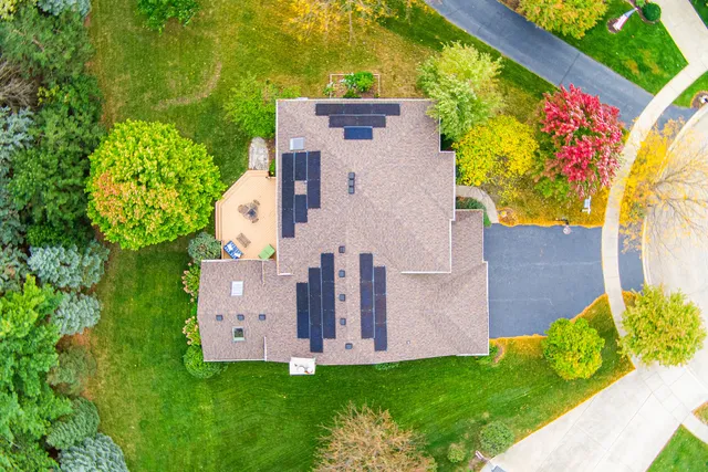an aerial view of residential house with outdoor space