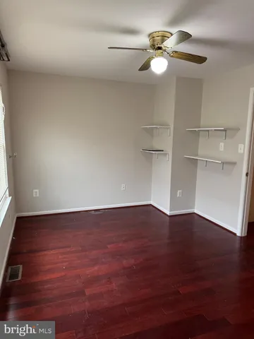 a bathroom with a white bath tub and a shower