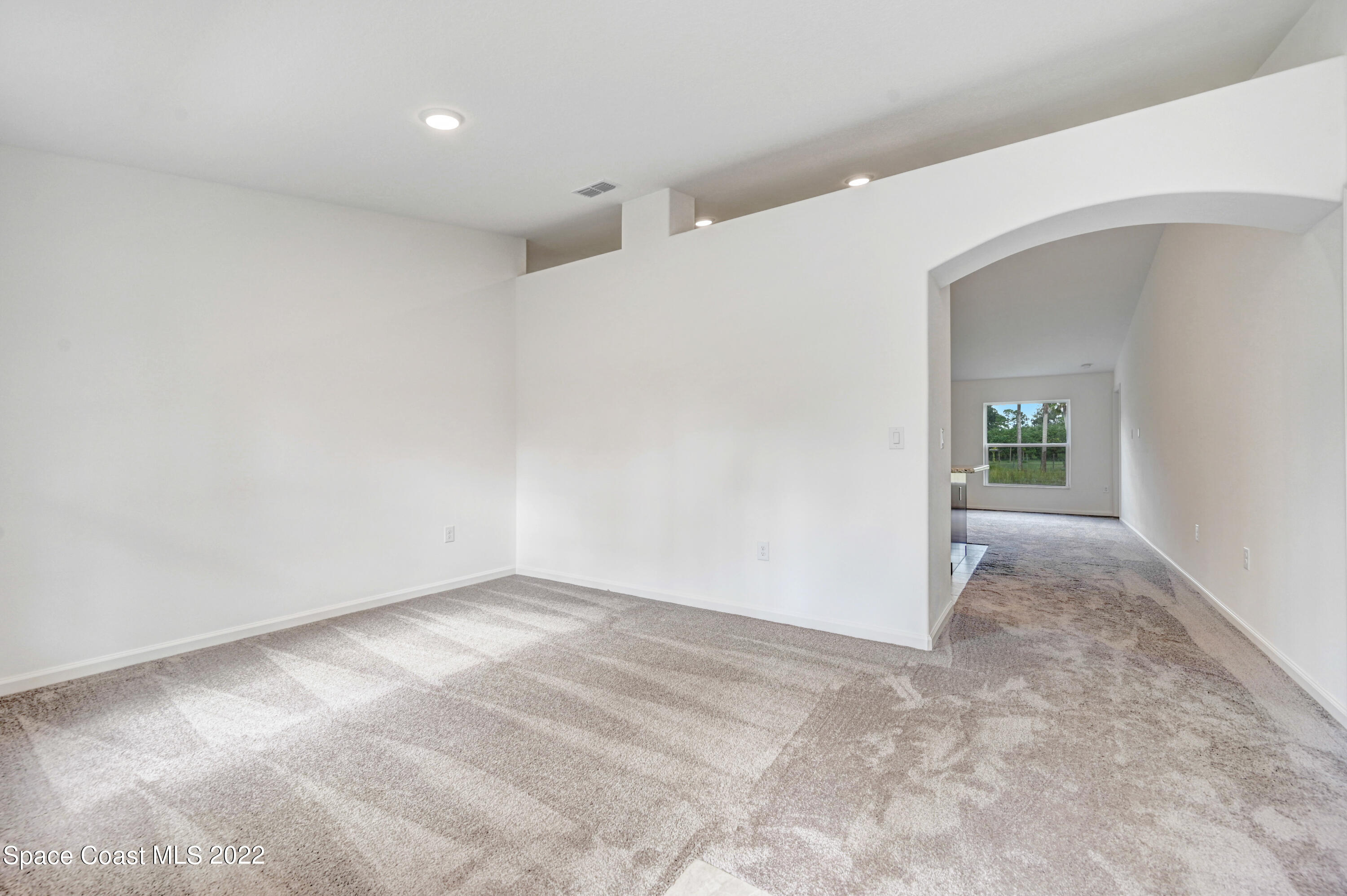 561 Scenic Road Palm Bay, FL 32908 - Photo 11 of 40 a view of an empty room