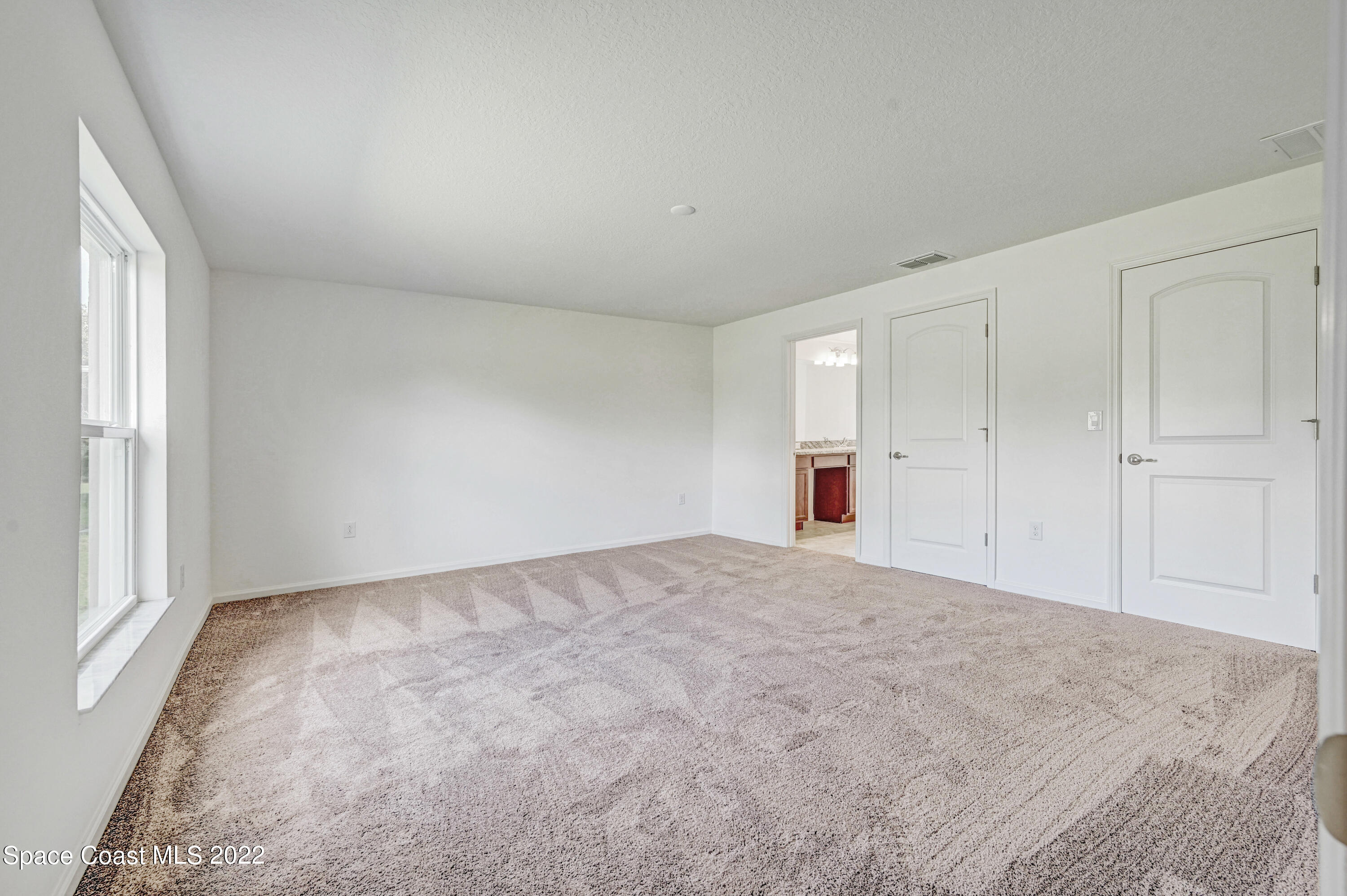 561 Scenic Road Palm Bay, FL 32908 - Photo 32 of 40 wooden floor in an empty room