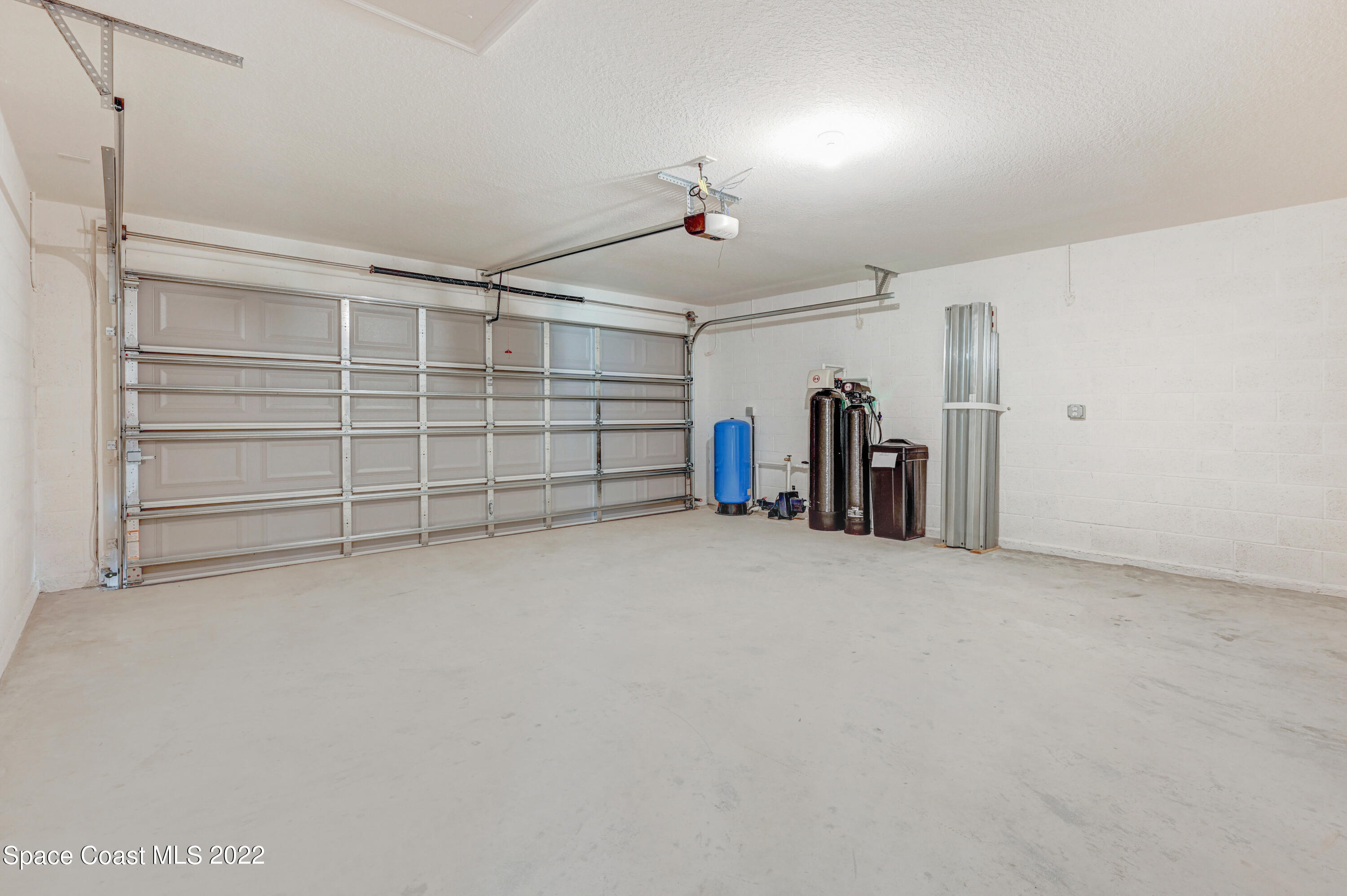 561 Scenic Road Palm Bay, FL 32908 - Photo 40 of 40 a view of an empty room with closet and storage