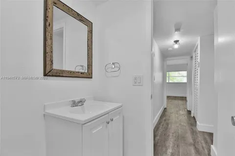 a view of a bathroom from the hallway