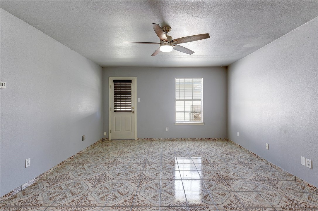 6402 Santos Street Austin, TX 78741 - Photo 5 of 22 a view of an empty room with a window