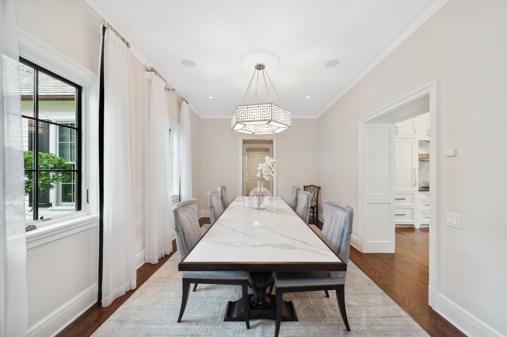 1120 Elm Tree Road Lake Forest, IL 60045 - Photo 5 of 34 a view of a dining room with furniture window and wooden floor