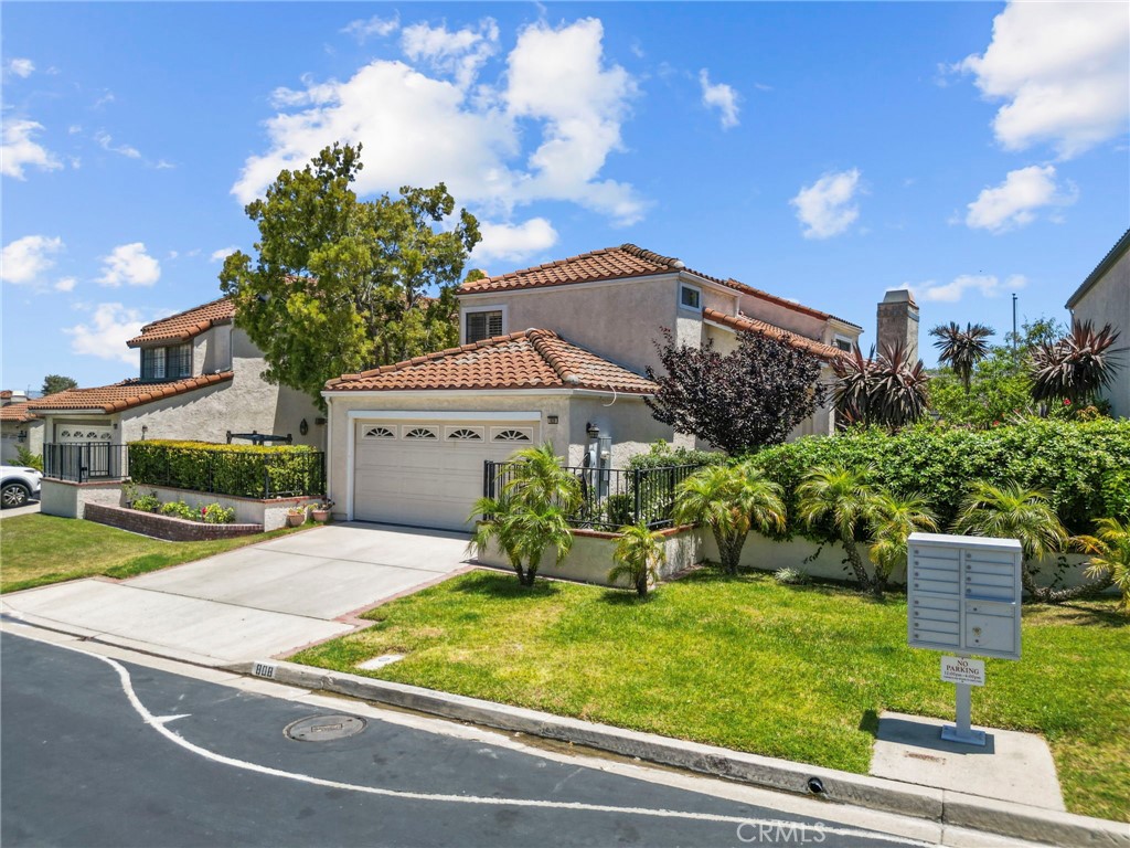 808 Links View Drive Simi Valley, CA 93065 - Photo 2 of 28 a front view of a house with garden