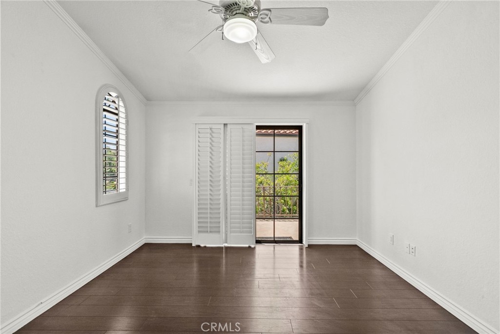 808 Links View Drive Simi Valley, CA 93065 - Photo 24 of 28 a view of an empty room with a window and wooden floor