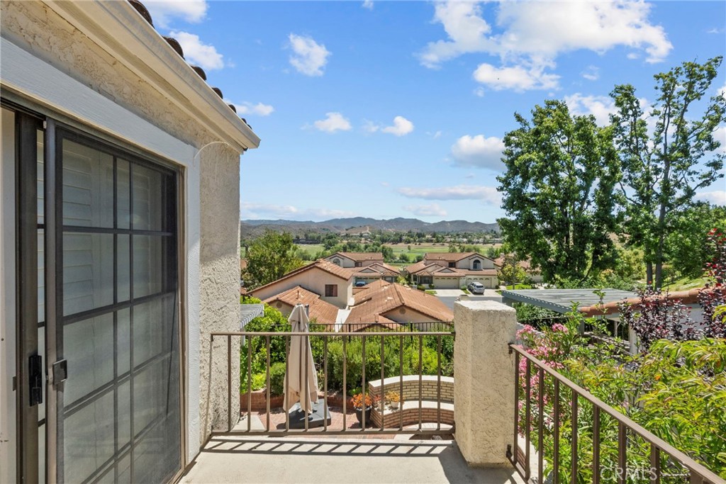 808 Links View Drive Simi Valley, CA 93065 - Photo 26 of 28 a view of a houses with a city from a balcony
