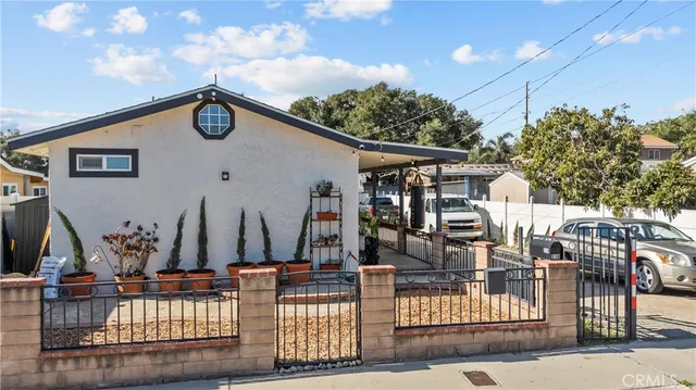 a view of house with a street