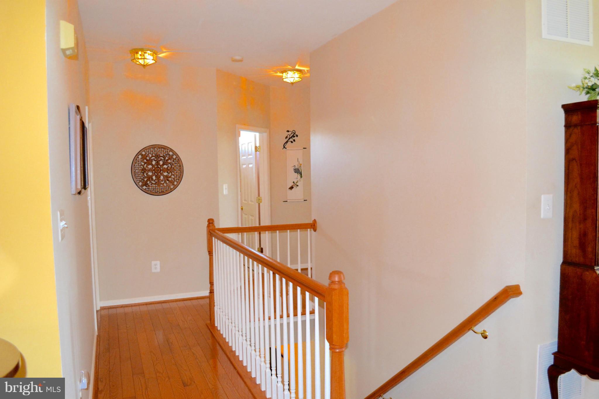 16596 Wayland Road Culpeper, VA 22701 - Photo 17 of 30 Hall to bedrooms and stairs to lower level