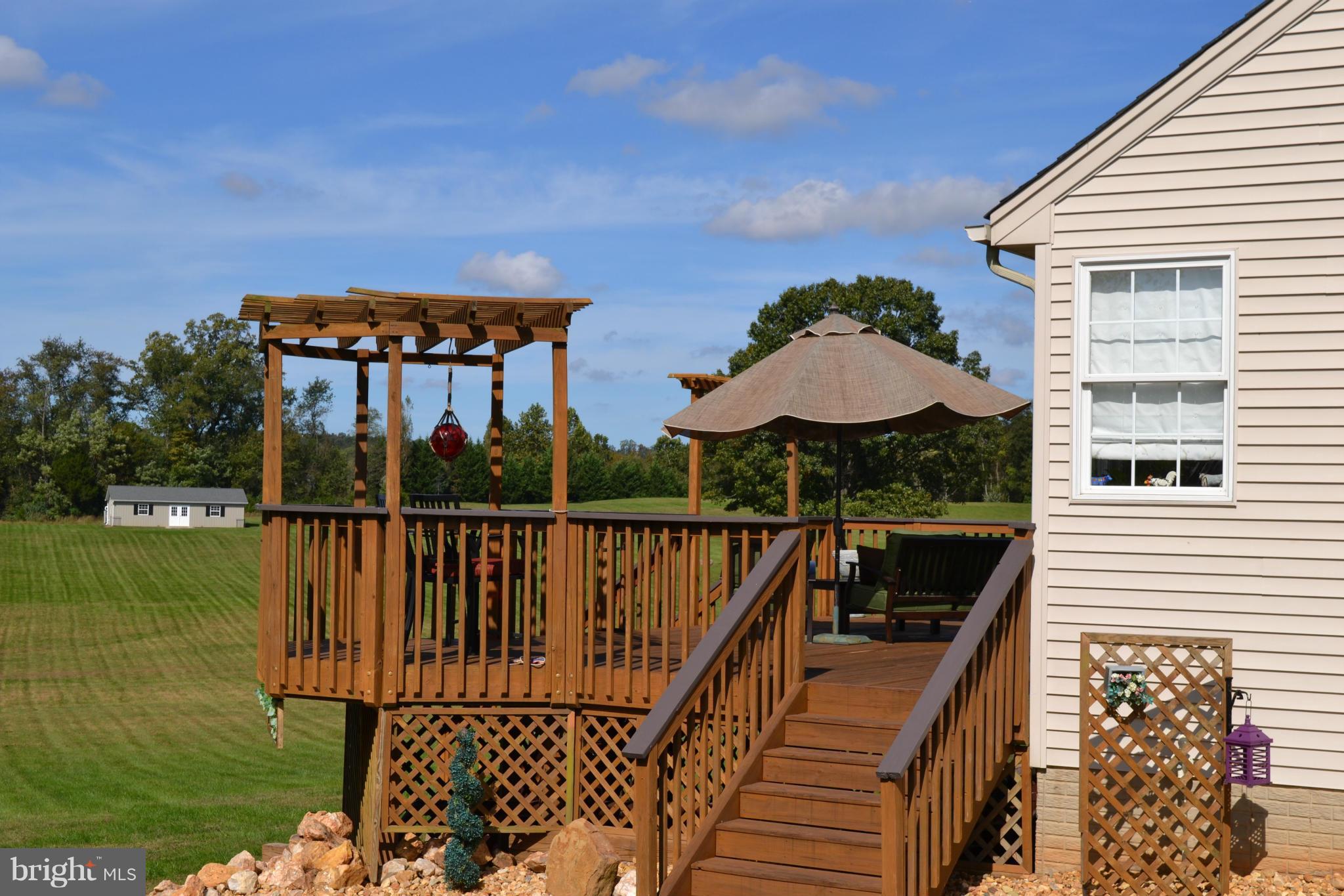 16596 Wayland Road Culpeper, VA 22701 - Photo 22 of 30 Rear deck with pergola