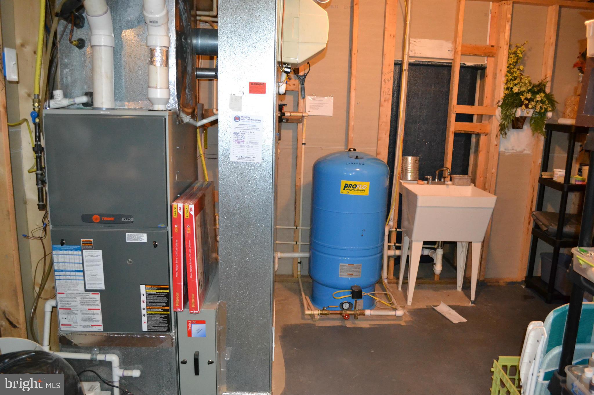 16596 Wayland Road Culpeper, VA 22701 - Photo 24 of 30 Basement w/ laundry sink & equipment
