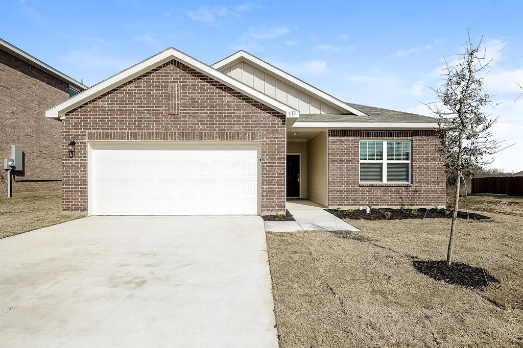 a backyard of a house with wooden fence