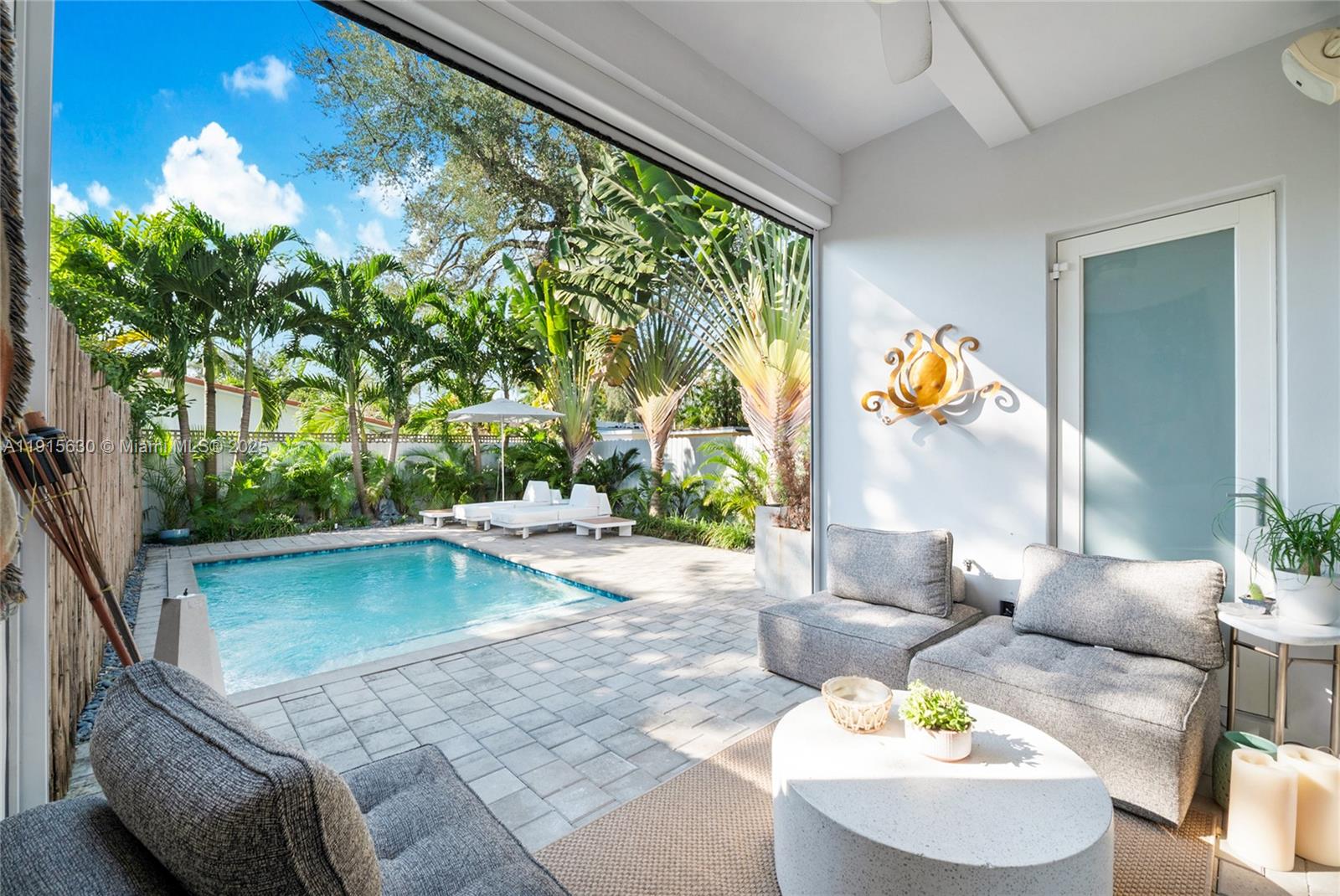 2410 Southwest 16th Avenue Miami, FL 33145 - Photo 17 of 25 a living room with furniture and a large window