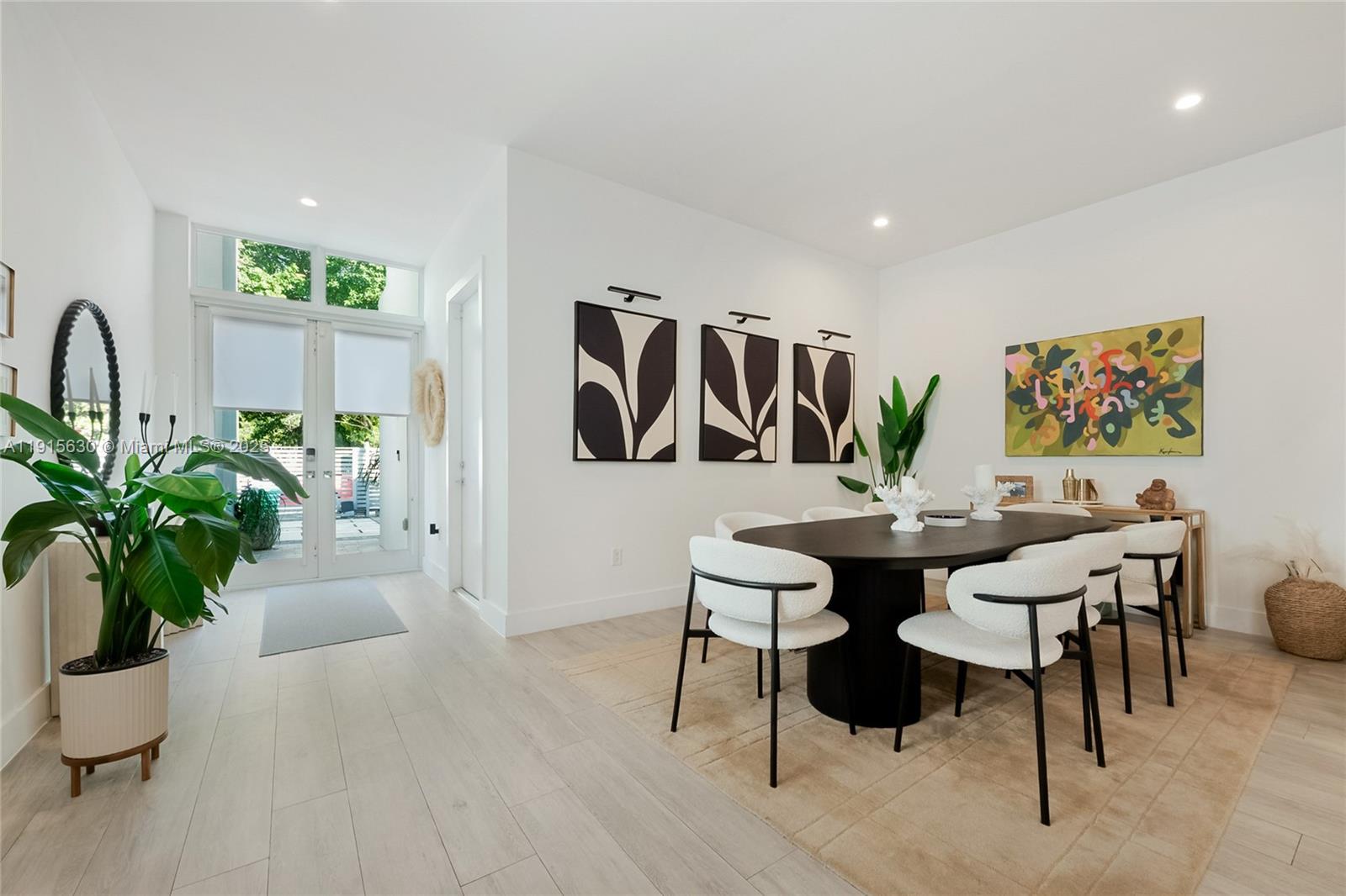 2410 Southwest 16th Avenue Miami, FL 33145 - Photo 7 of 25 a view of a livingroom with furniture and a potted plant
