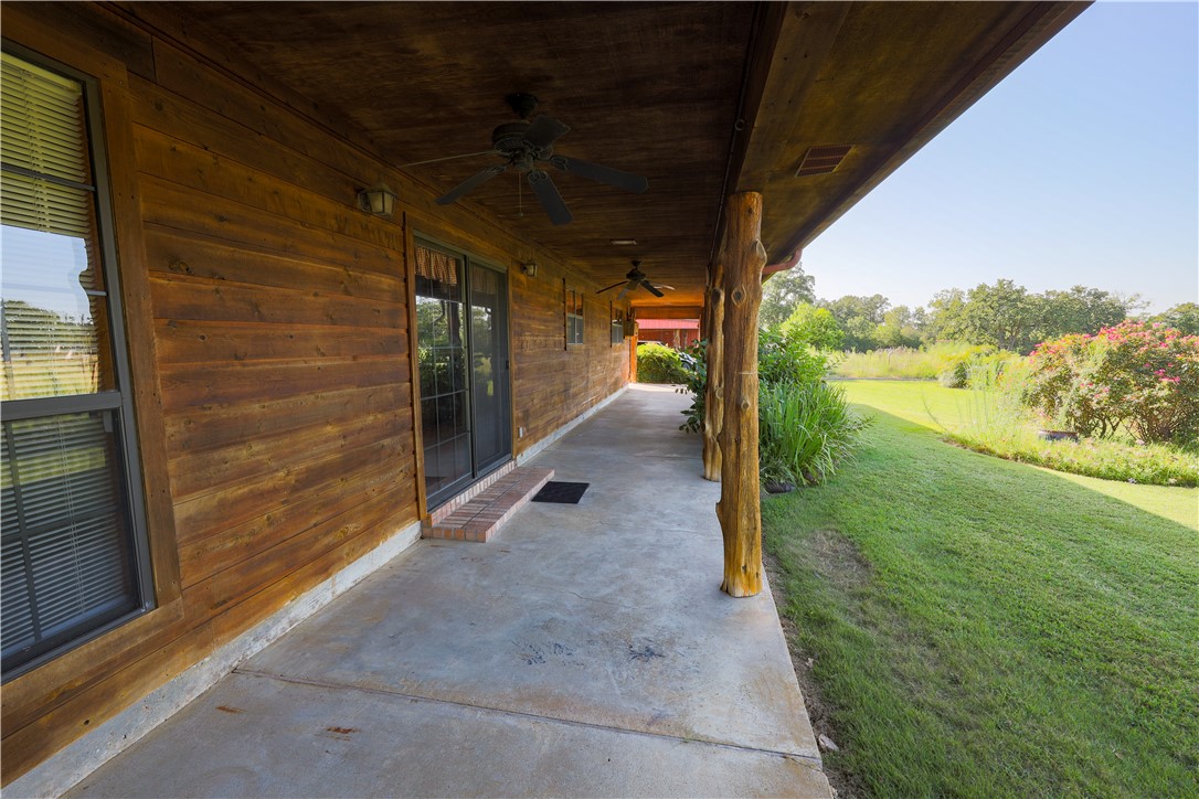16403-16515 Macey Road Hearne, TX 77859 - Photo 11 of 46 a view of a porch with furniture and garden
