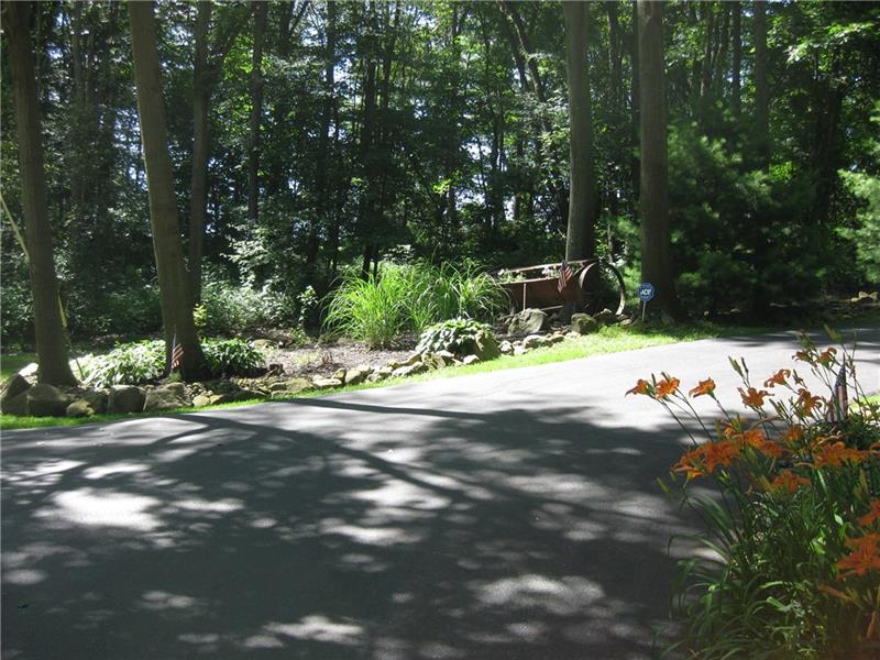 497 Cannery Road Mercer, PA 16137 - Photo 5 of 25 End of driveway.....well maintained black top drive and landscaping.