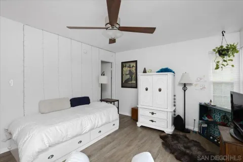 a large white bed in a white room