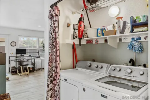 a bedroom with a bed and a table in it