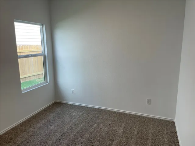 a view of a backyard with barn