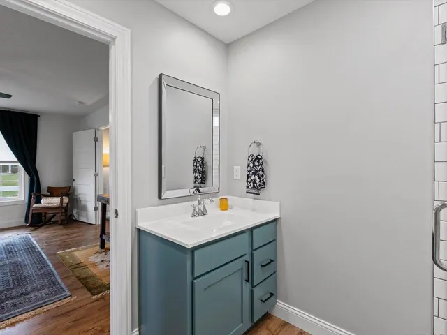 a bed room with a bed and a window