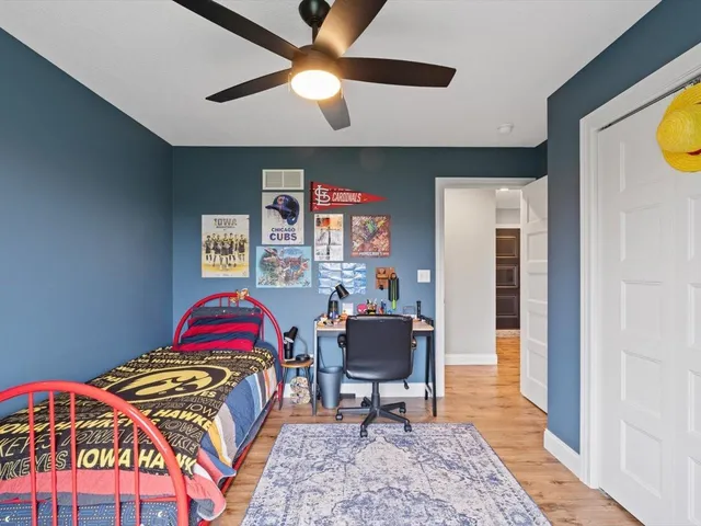 a kitchen with stainless steel appliances kitchen island granite countertop a sink and cabinets