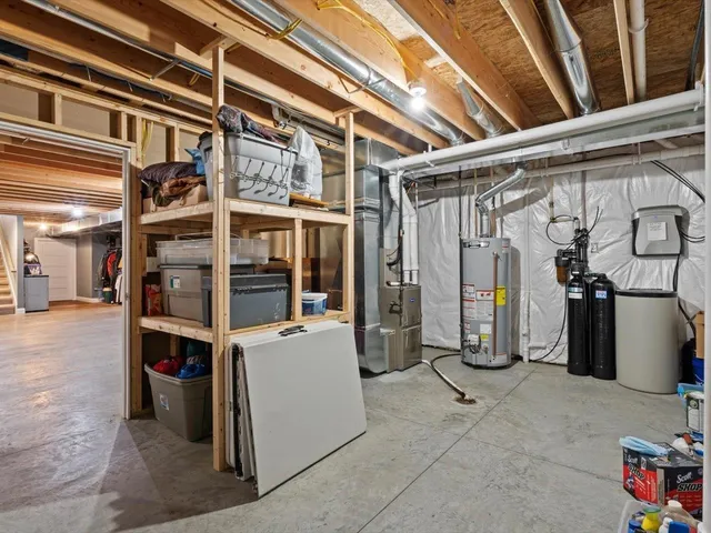 an aerial view of a houses with a yard