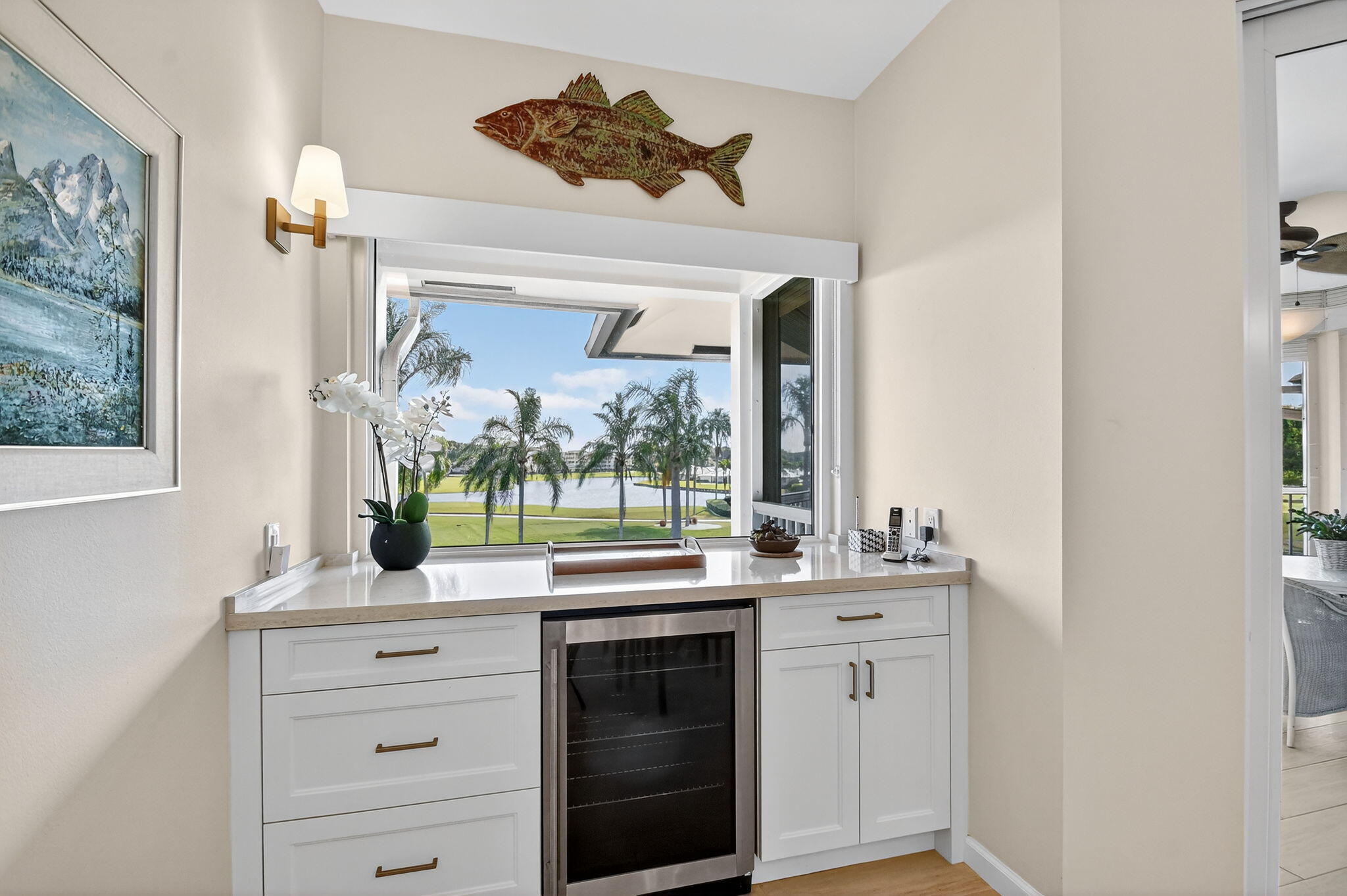 194 Orange Tree Drive, Unit G Atlantis, FL 33462 - Photo 13 of 36 a bathroom with a double vanity sink and a mirror