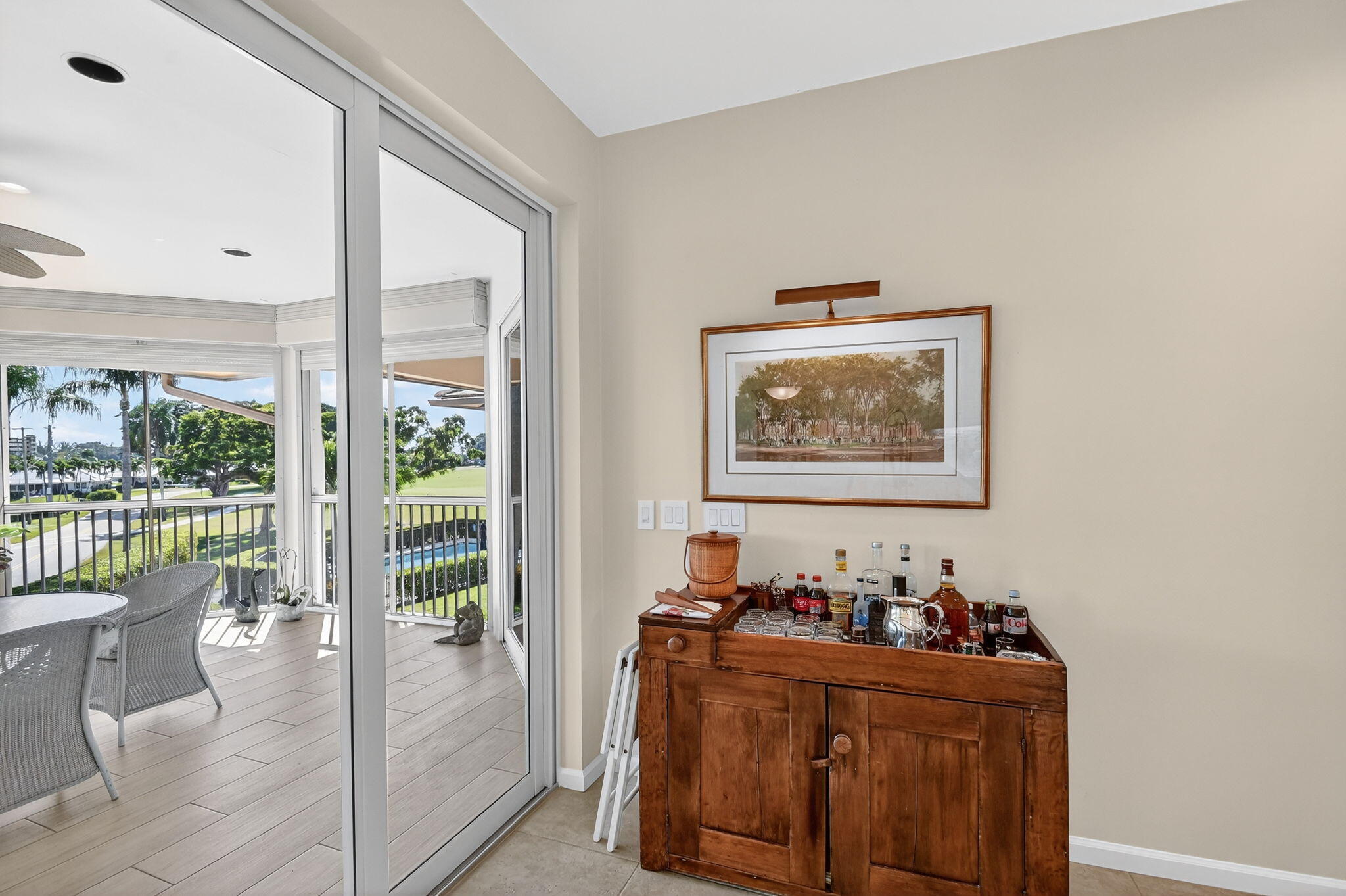 194 Orange Tree Drive, Unit G Atlantis, FL 33462 - Photo 15 of 36 a room with furniture and window