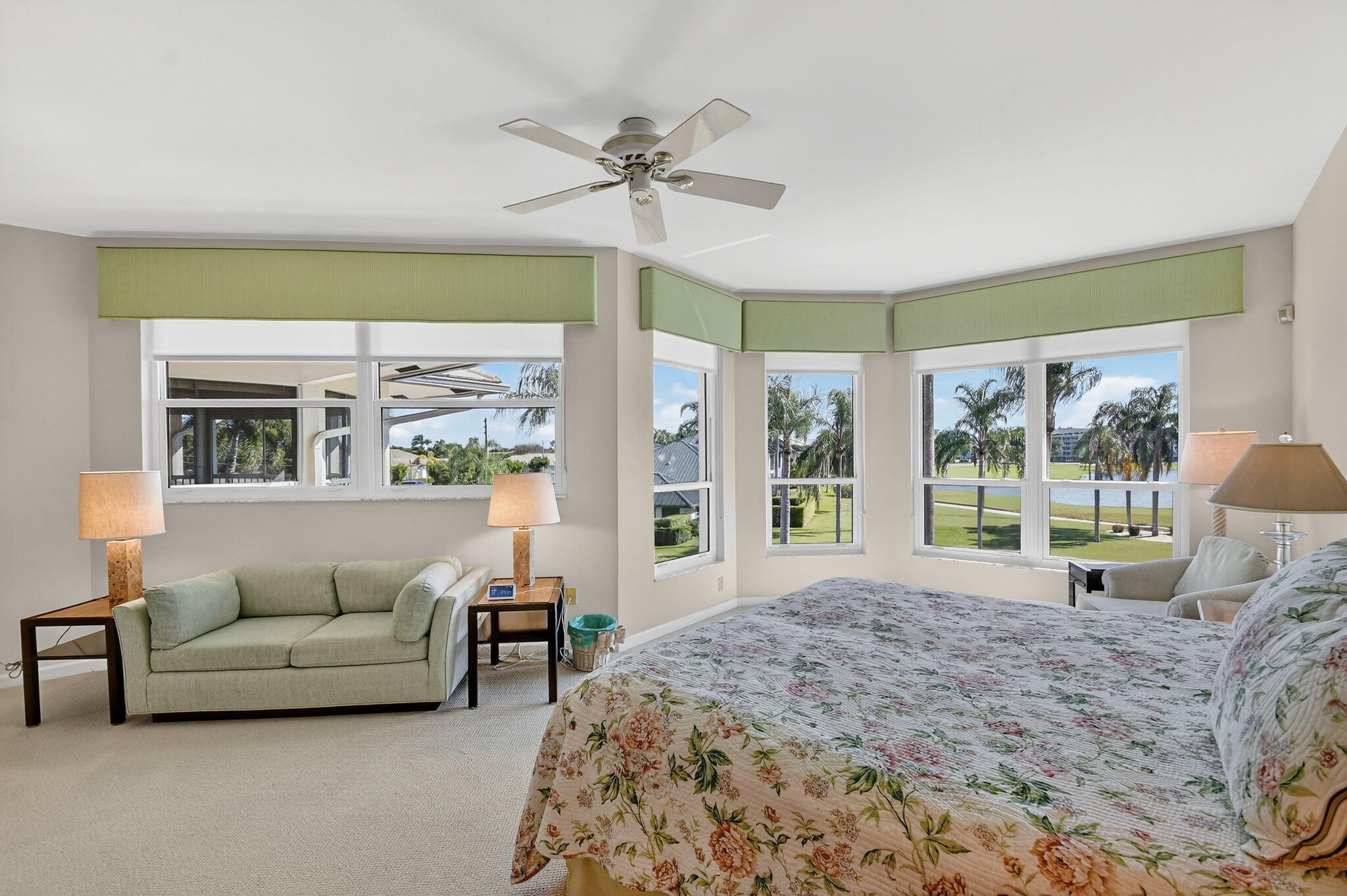 194 Orange Tree Drive, Unit G Atlantis, FL 33462 - Photo 19 of 36 a living room with furniture and a large window