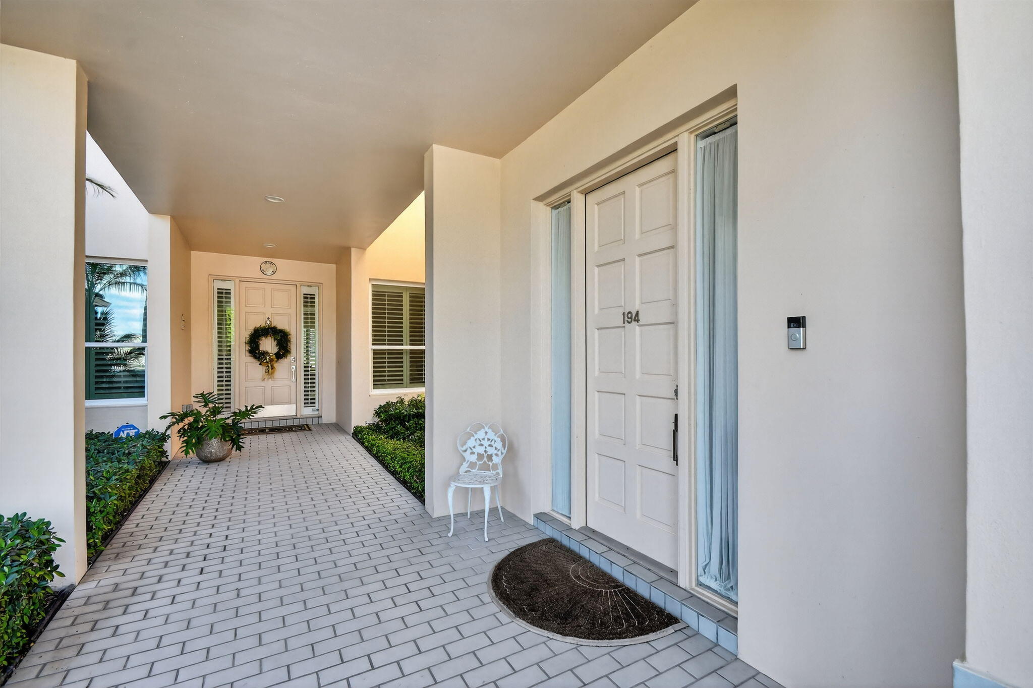194 Orange Tree Drive, Unit G Atlantis, FL 33462 - Photo 31 of 36 a view of a entrance