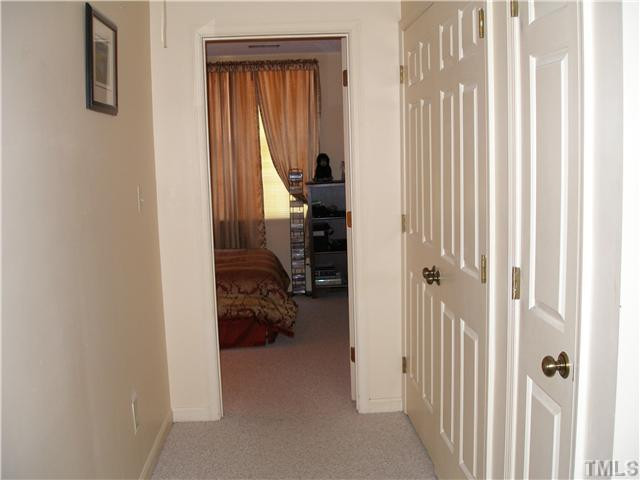 3316 Comstock Road Raleigh, NC 27604 - Photo 8 of 9 a view of a livingroom with furniture and front door