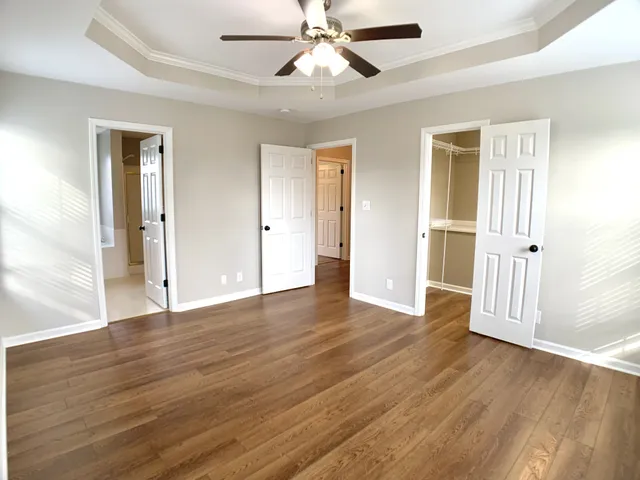 a bathroom with a bath tub and shower