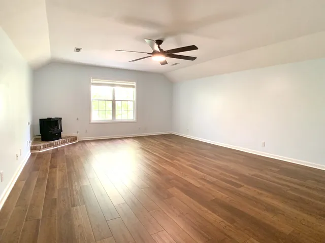a view of a house with a big yard