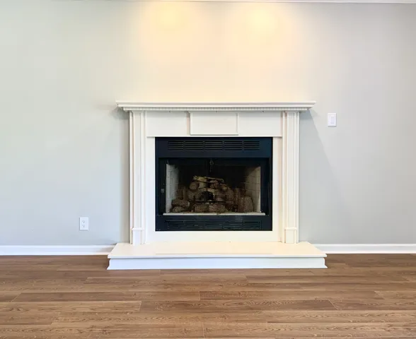 a kitchen with granite countertop a stove and a sink
