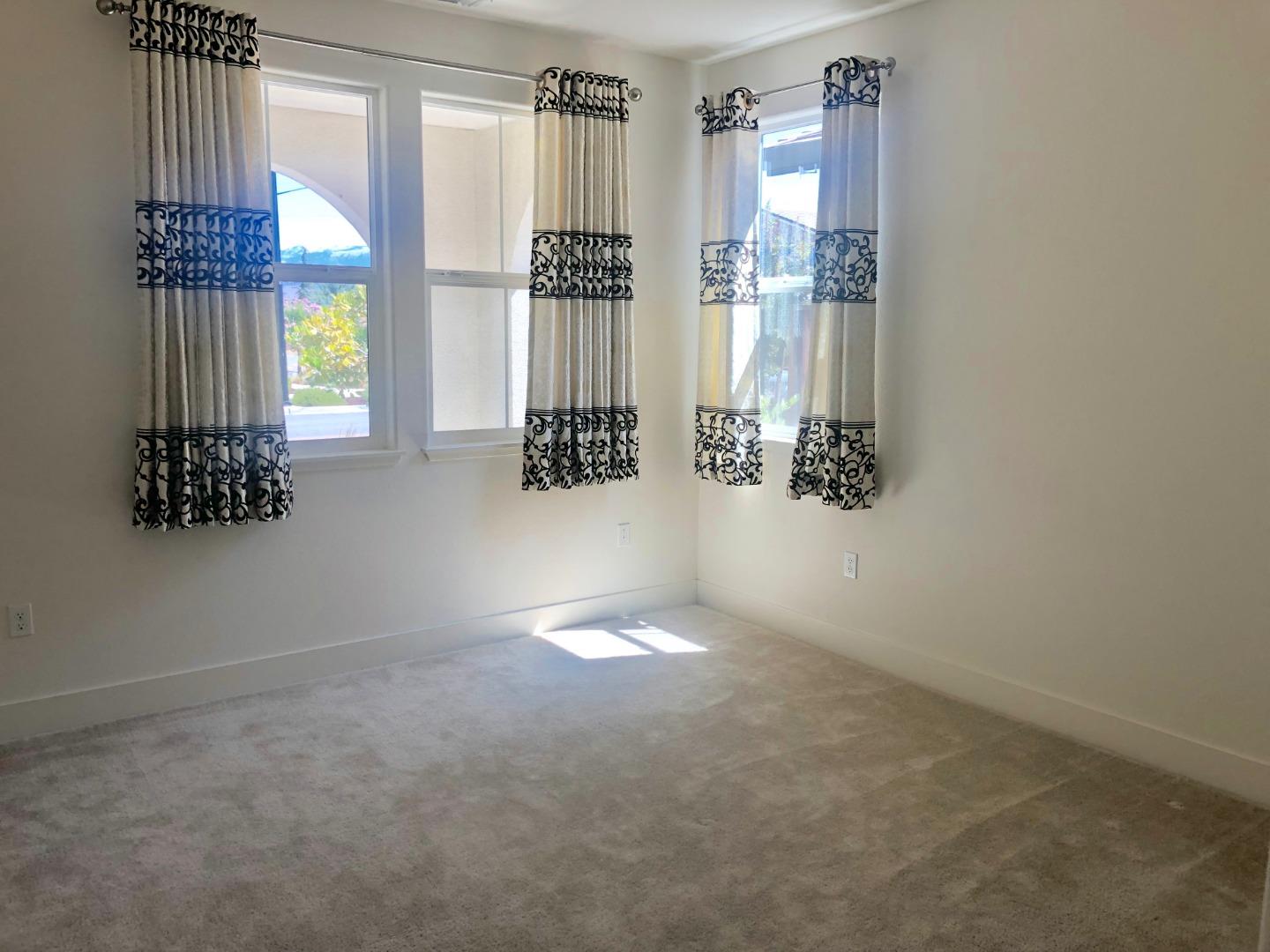 950 Puma Way Gilroy, CA 95020 - Photo 12 of 17 a view of an empty room with a window