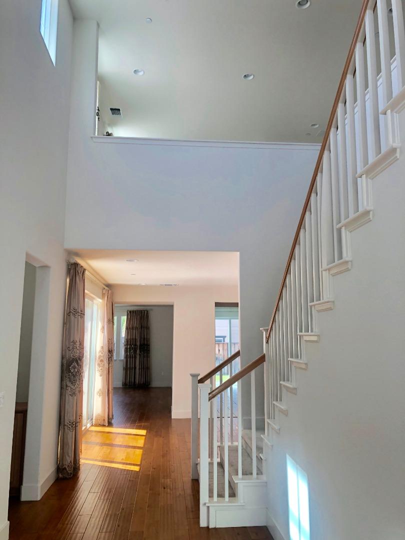 950 Puma Way Gilroy, CA 95020 - Photo 6 of 17 a view of staircase with white walls and a window