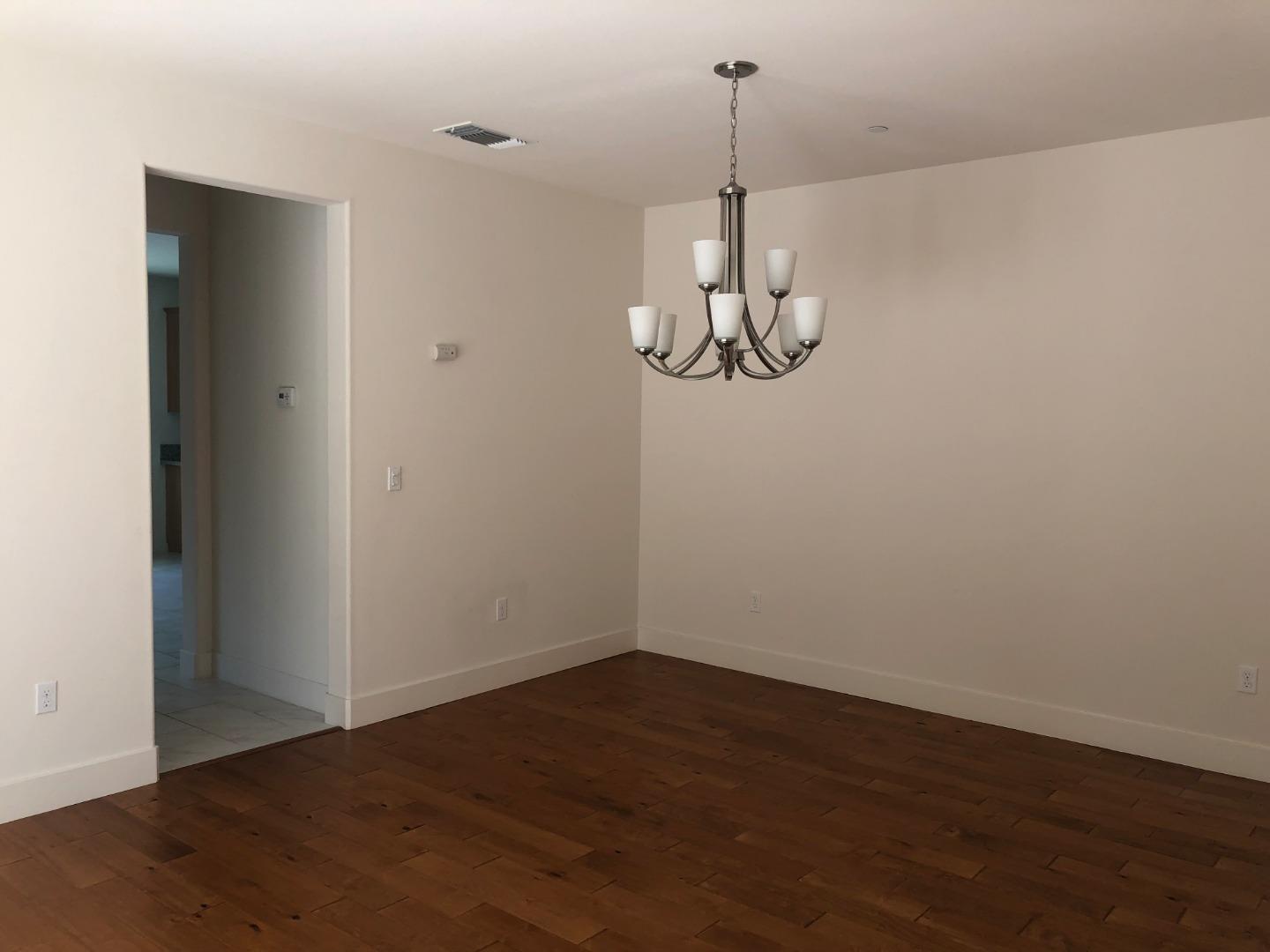 950 Puma Way Gilroy, CA 95020 - Photo 8 of 17 a view of a room with wooden floor and air conditioner