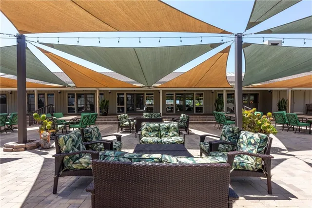 an outdoor space with seating area