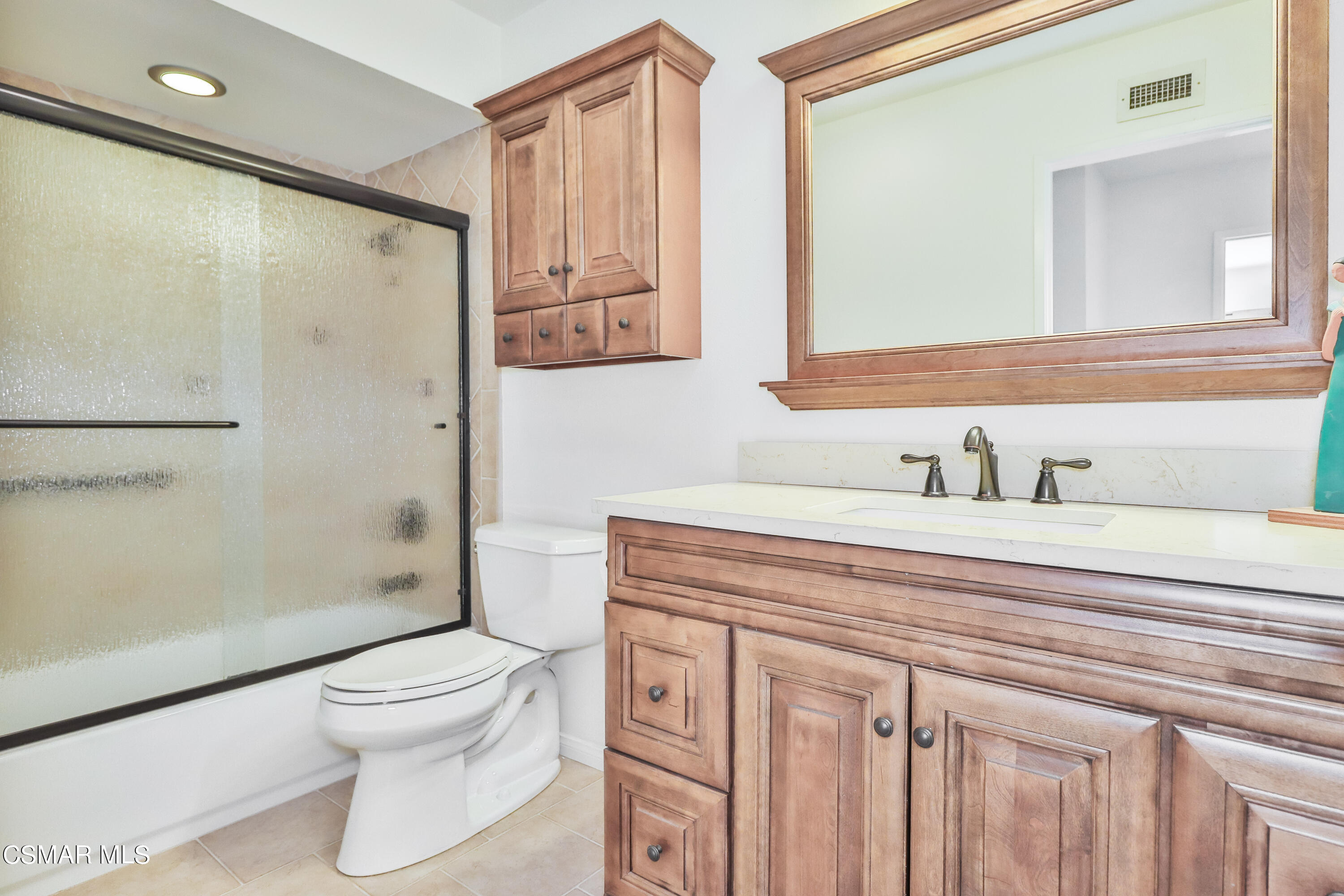 4220 Springfield Street Simi Valley, CA 93063 - Photo 70 of 95 a bathroom with a sink a toilet and shower