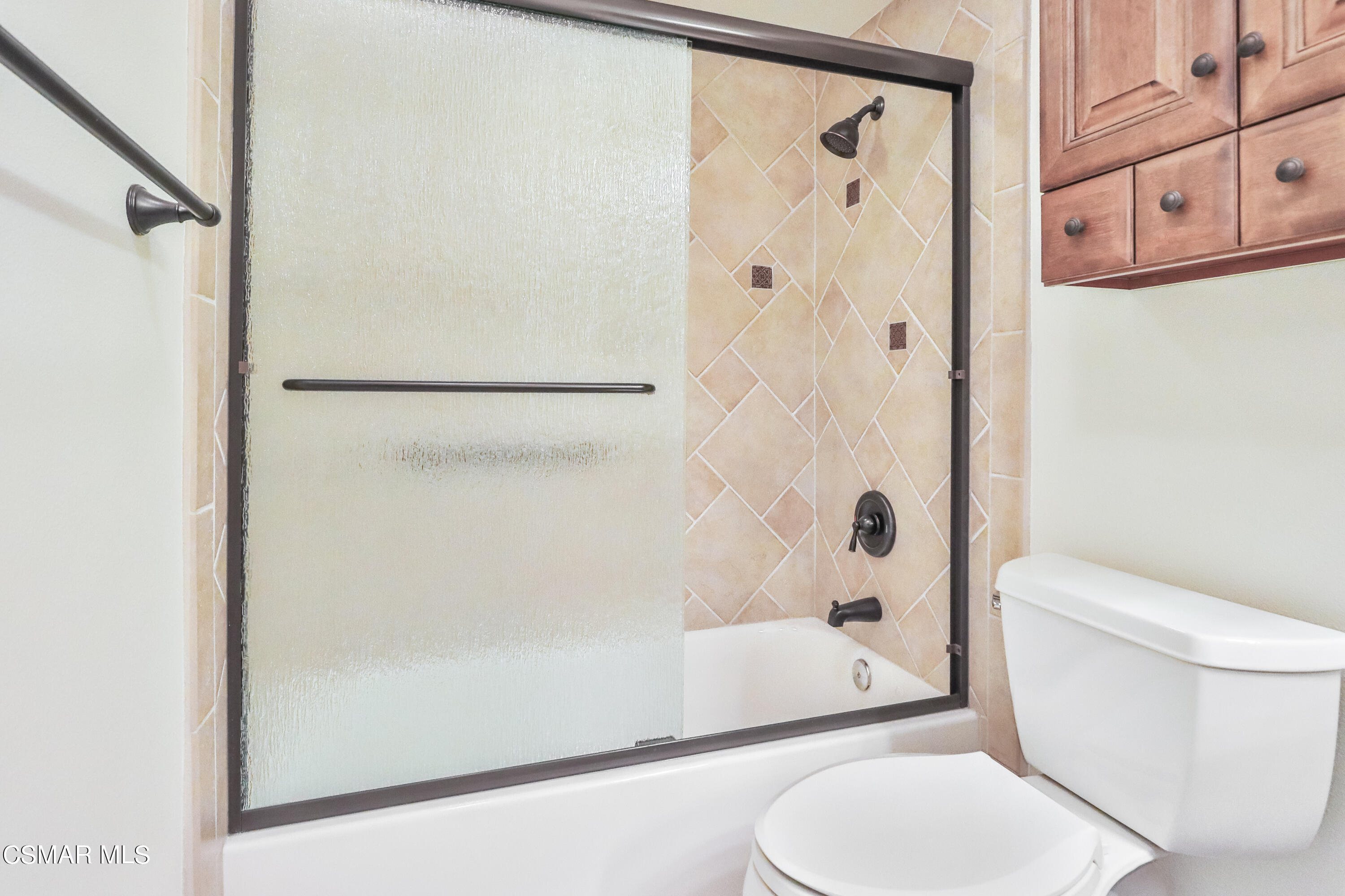 4220 Springfield Street Simi Valley, CA 93063 - Photo 72 of 95 a white toilet sitting next to a bath tub