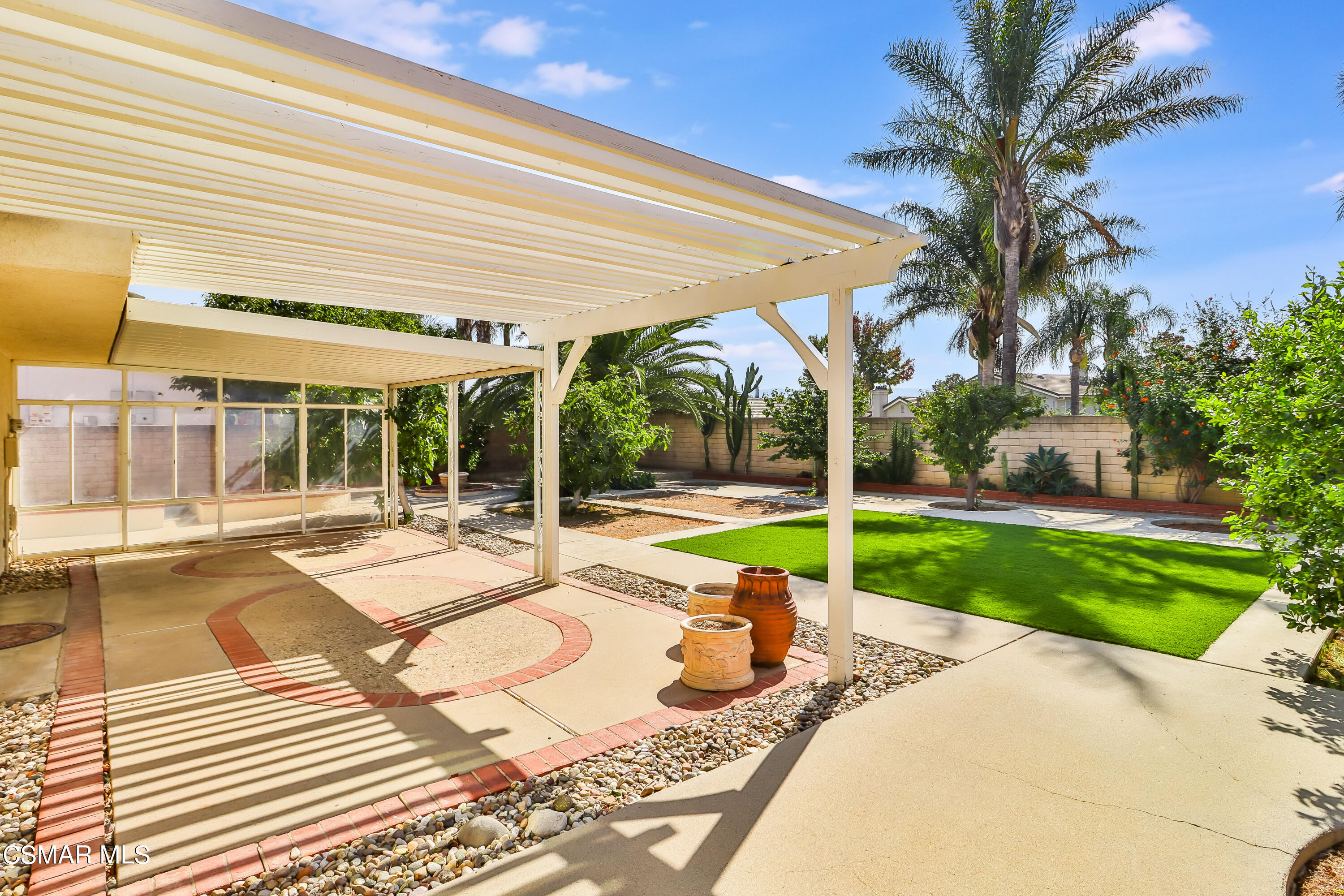 4220 Springfield Street Simi Valley, CA 93063 - Photo 83 of 95 a view of a house with backyard and sitting area