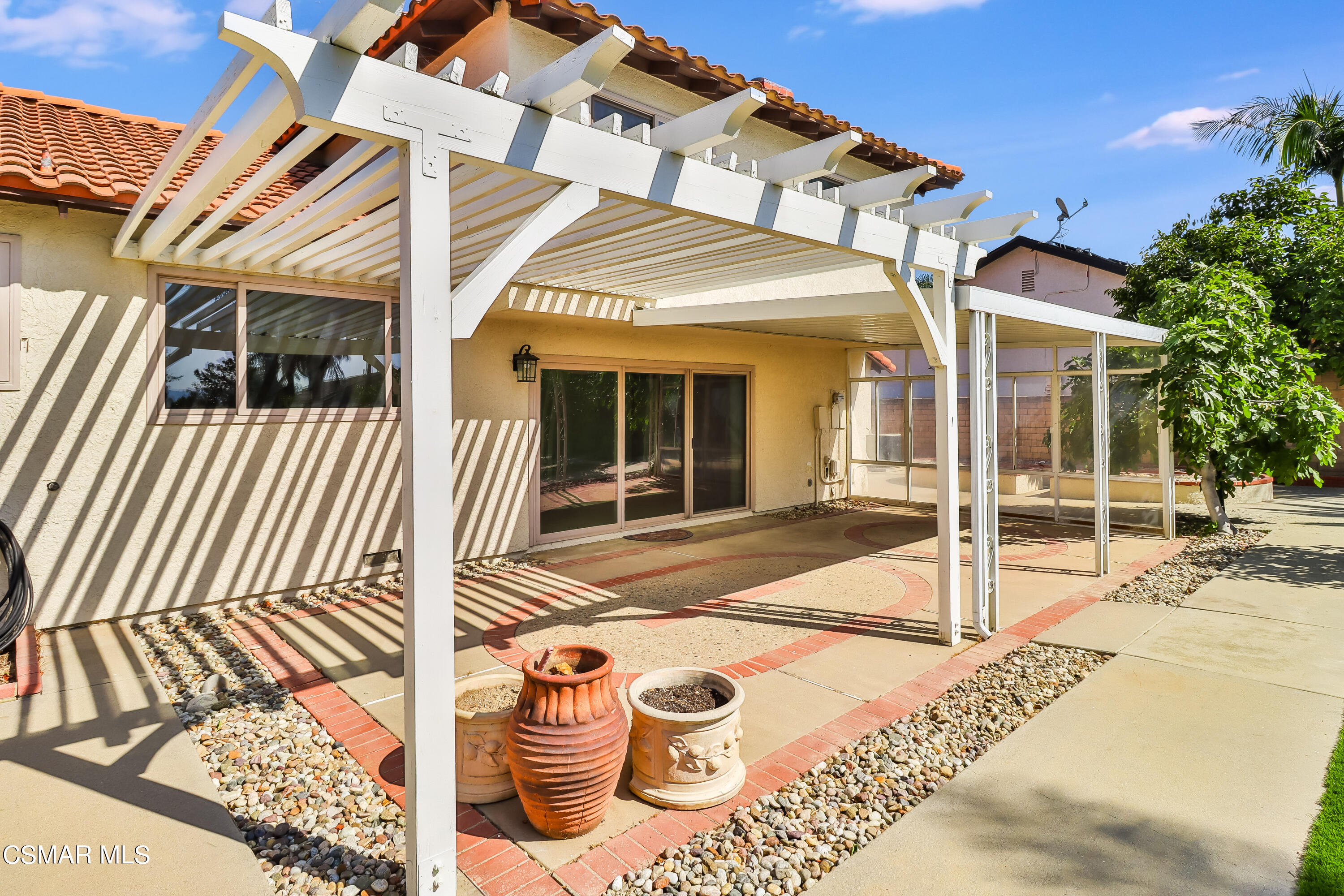 4220 Springfield Street Simi Valley, CA 93063 - Photo 84 of 95 a view of a house with floor to ceiling windows and wooden floor