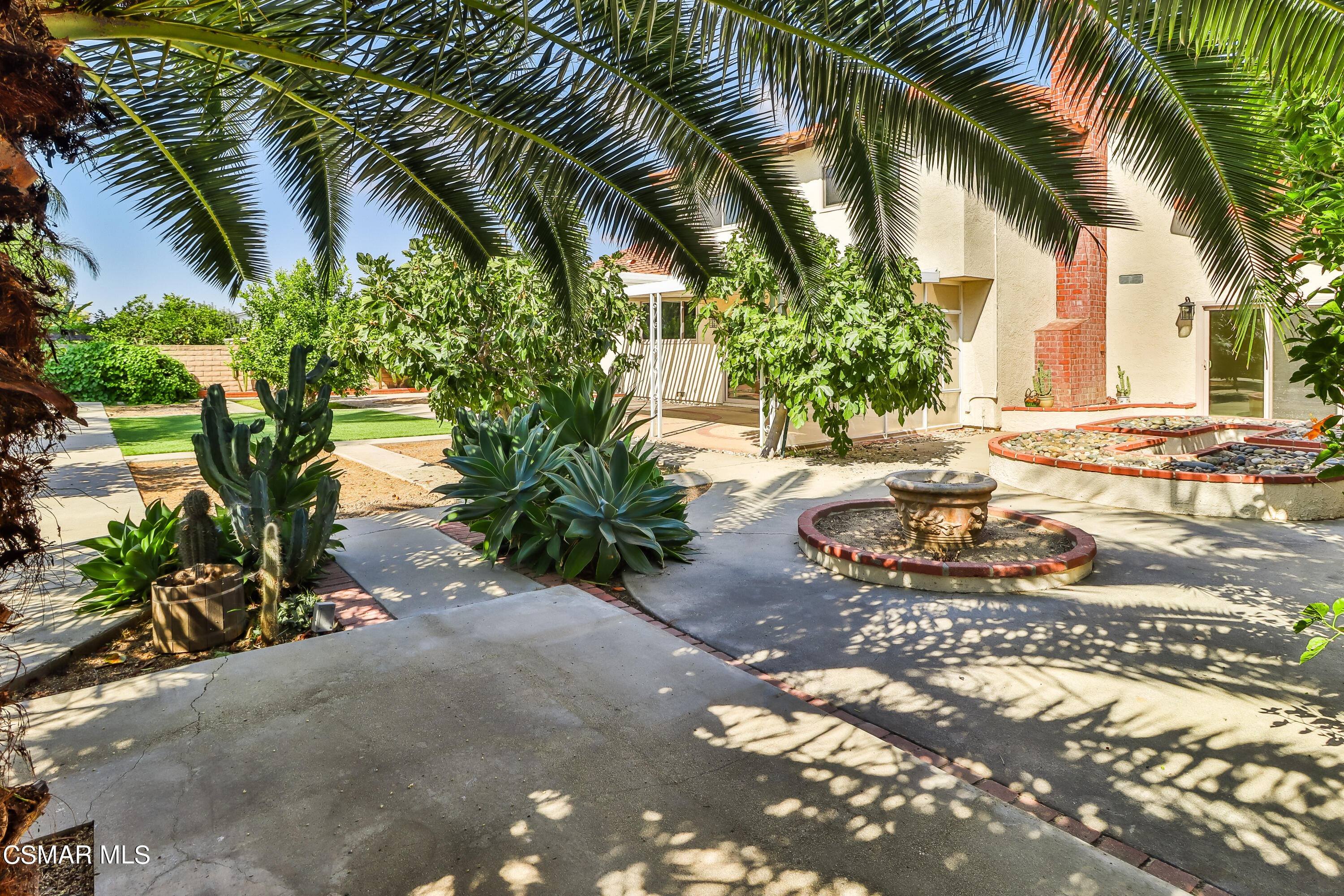 4220 Springfield Street Simi Valley, CA 93063 - Photo 92 of 95 a row of palm trees with a yard