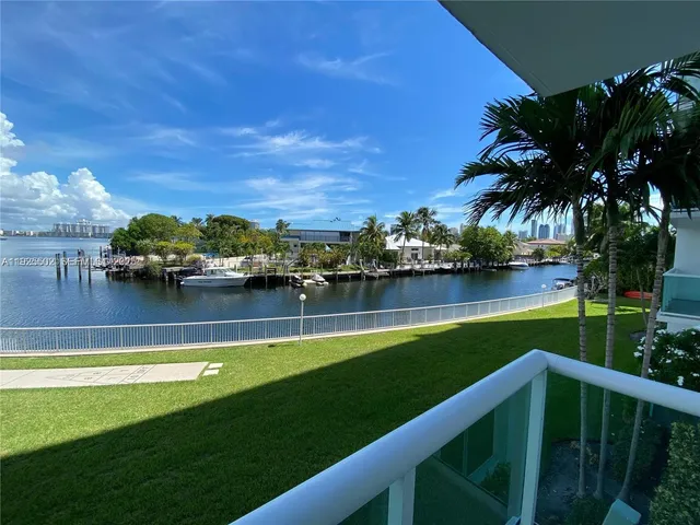 a view of a swimming pool with a lake view